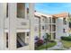 Exterior view of condo building and walkway at 3012 Parkway Blvd # 102, Kissimmee, FL 34747
