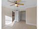 Bright bedroom with ceiling fan and neutral walls at 3012 Parkway Blvd # 102, Kissimmee, FL 34747