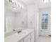 Clean bathroom, featuring vanity, single sink, and mirrored medicine cabinet at 359 Marquee Dr, Kissimmee, FL 34758
