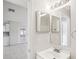 Clean bathroom with vanity, sink, and mirrored medicine cabinet at 359 Marquee Dr, Kissimmee, FL 34758