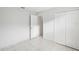 Bedroom with tile floors, a closet, and access to a hallway at 359 Marquee Dr, Kissimmee, FL 34758