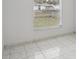 Well-lit bedroom with tile floors and large window at 359 Marquee Dr, Kissimmee, FL 34758