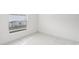 Bright bedroom with tile floors and a window at 359 Marquee Dr, Kissimmee, FL 34758