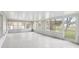 Spacious lanai with tile floors and screened windows at 359 Marquee Dr, Kissimmee, FL 34758