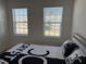 Bedroom with double bed, and views of the neighborhood at 5231 Maddie Dr, Haines City, FL 33844
