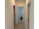 Bright hallway with access to bedrooms and other rooms at 5231 Maddie Dr, Haines City, FL 33844