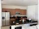 Modern kitchen with stainless steel appliances at 5231 Maddie Dr, Haines City, FL 33844