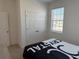Bedroom with a double bed and large closet at 5231 Maddie Dr, Haines City, FL 33844