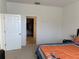 Bedroom with walk-in closet and a queen-size bed at 5231 Maddie Dr, Haines City, FL 33844