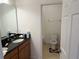 Bathroom with a toilet, bathtub, and double vanity at 5231 Maddie Dr, Haines City, FL 33844