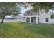 Spacious backyard with large tree at 545 Palio Ct, Ocoee, FL 34761
