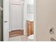 Simple bathroom with a vanity, toilet, and access to a closet at 545 Palio Ct, Ocoee, FL 34761
