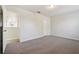 Spacious bedroom with carpeted floor and access to a hallway at 545 Palio Ct, Ocoee, FL 34761