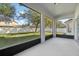 Screened porch overlooking backyard at 545 Palio Ct, Ocoee, FL 34761