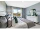 Main bedroom with ample light and dresser at 1683 Three Bars Rd, Kissimmee, FL 34744