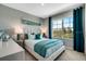 Bright bedroom featuring a comfortable bed and natural light at 1683 Three Bars Rd, Kissimmee, FL 34744