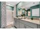 Double vanity bathroom with granite countertop at 1683 Three Bars Rd, Kissimmee, FL 34744