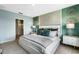 King-size bed in a well-lit Primary bedroom with ensuite access at 1683 Three Bars Rd, Kissimmee, FL 34744