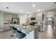 Open concept kitchen with island and stainless steel appliances at 1683 Three Bars Rd, Kissimmee, FL 34744