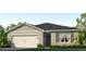 One-story home with a two-car garage and landscaped yard at 1683 Three Bars Rd, Kissimmee, FL 34744