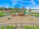 Enclosed playground with swings and play structures at 1683 Three Bars Rd, Kissimmee, FL 34744
