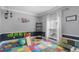 Fun playroom with colorful flooring, alphabet mat, and play equipment at 2138 Inverness Ct, Oviedo, FL 32765