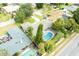 Bird's-eye view of the home, showcasing the pool and landscaping at 2518 Sweetwater Trl, Winter Park, FL 32789