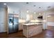 Modern kitchen with stainless steel appliances and a large island at 2518 Sweetwater Trl, Winter Park, FL 32789