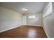 Spacious bedroom with hardwood floors and neutral wall colors at 2518 Sweetwater Trl, Winter Park, FL 32789