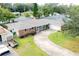 Ranch style home with a large backyard and circular driveway at 2518 Sweetwater Trl, Winter Park, FL 32789