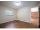 Spacious bedroom with hardwood floors and access to backyard at 2518 Sweetwater Trl, Winter Park, FL 32789