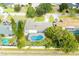 Property view showing home, pool, and neighborhood at 2518 Sweetwater Trl, Winter Park, FL 32789