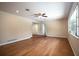 Spacious living room featuring hardwood floors and a ceiling fan at 2518 Sweetwater Trl, Winter Park, FL 32789