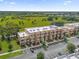 Aerial view of townhome community, showcasing location and parking at 3215 Brasilia Ave, Kissimmee, FL 34747