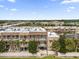 Aerial view of community with multiple buildings and pool at 3215 Brasilia Ave, Kissimmee, FL 34747