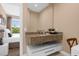 Modern bathroom with a floating vanity and granite countertop at 3215 Brasilia Ave, Kissimmee, FL 34747