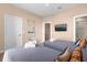 Bright bedroom with two twin beds and artwork at 3215 Brasilia Ave, Kissimmee, FL 34747