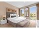 Spacious bedroom with a comfortable bed and plenty of natural light at 3215 Brasilia Ave, Kissimmee, FL 34747