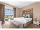 Main bedroom with private balcony and tranquil view at 3215 Brasilia Ave, Kissimmee, FL 34747