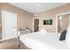 Bright bedroom with a king-size bed and en-suite bathroom access at 3215 Brasilia Ave, Kissimmee, FL 34747
