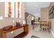 Open concept dining area with a view into the kitchen at 3215 Brasilia Ave, Kissimmee, FL 34747