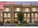 Townhome building at dusk, well-lit and modern at 3215 Brasilia Ave, Kissimmee, FL 34747