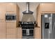 Modern kitchen with stainless steel appliances at 3215 Brasilia Ave, Kissimmee, FL 34747