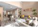 Open living room with high ceilings, and view to kitchen at 3215 Brasilia Ave, Kissimmee, FL 34747