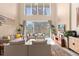 Spacious living room with high ceilings and sliding doors to patio at 3215 Brasilia Ave, Kissimmee, FL 34747