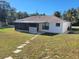 Single story home with screened patio and backyard at 3251 Sand Ct, Deltona, FL 32738