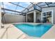 Inviting private pool in screened enclosure at 4285 Quote St, Kissimmee, FL 34746