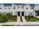 Modern townhome with 2 units and a paved walkway at 4285 Quote St, Kissimmee, FL 34746