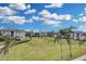 Aerial view of community with lush green areas at 8100 Princess Palm Ln # 305, Kissimmee, FL 34747