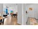 View of the dining area and kitchen from entryway at 8100 Princess Palm Ln # 305, Kissimmee, FL 34747